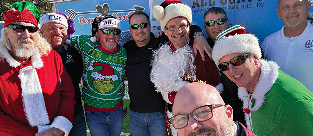 Krewe of Neptune volunteers at a community charity event